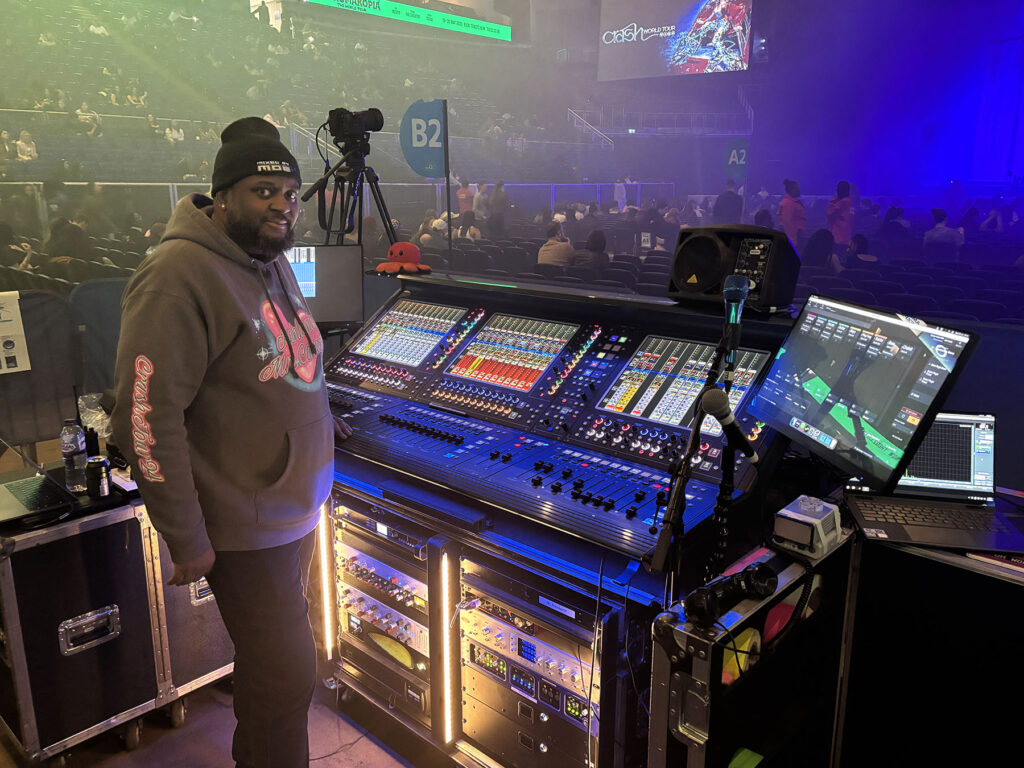 Kehlani FOH Engineer Moshe Davenport at Crash World Tour’s house mix position, featuring a DiGiCo Quantum338 Pulse console and Fourier Audio transform.engine