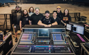 The audio crew from NF’s HOPE Tour at the DiGiCo SD5 FOH console. Pictured, left to right: Will Foley (systems engineer), JMo Davenport and Dustin Schluter (PA techs), Murphy Johnson (monitor engineer), Travis Stoker (FOH engineer/audio designer), Johnny Perez (playback), Jeremy Aparicio (drum tech), and Taylor Johannes (monitor tech)